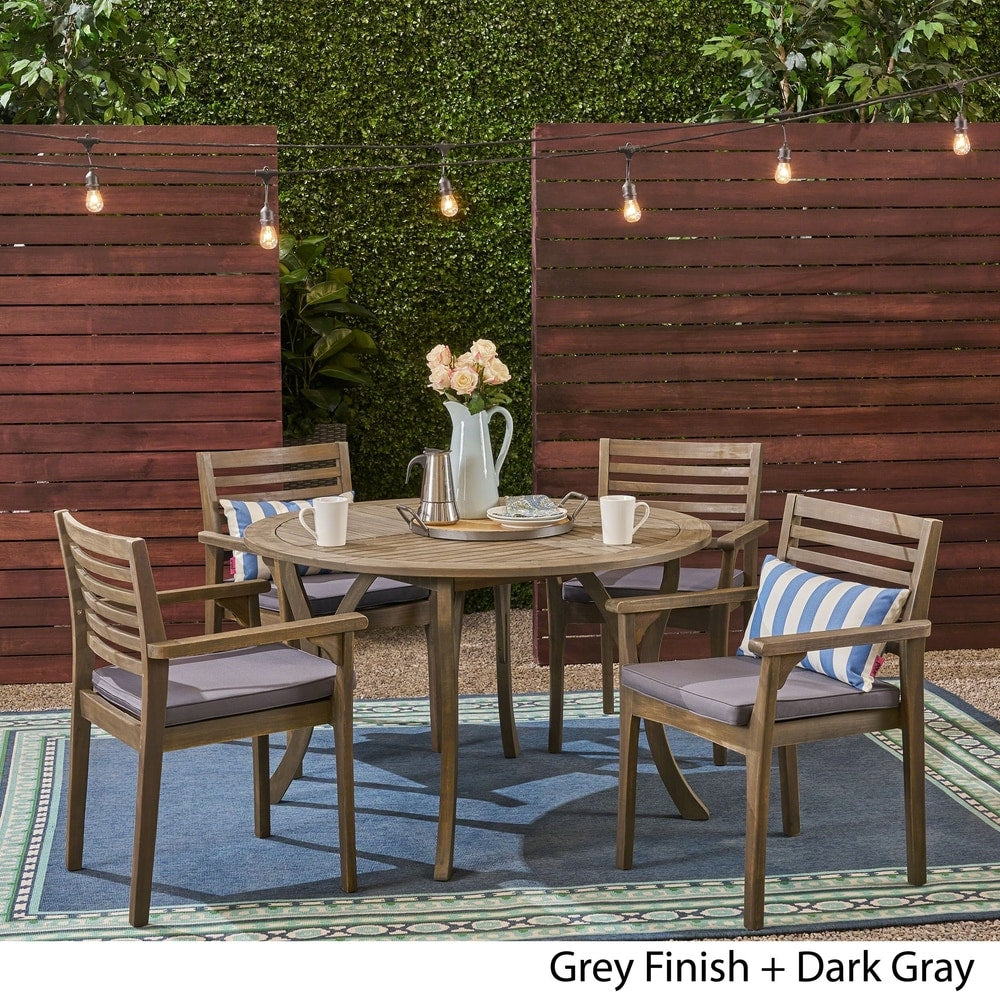 Ensemble de salle à manger rond Casa Outdoor 4 places 47 en acacia avec pieds sculptés par Christopher Knight Home