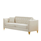 Canapé capitonné 3 places en chenille avec décoration cloutée en cuivre