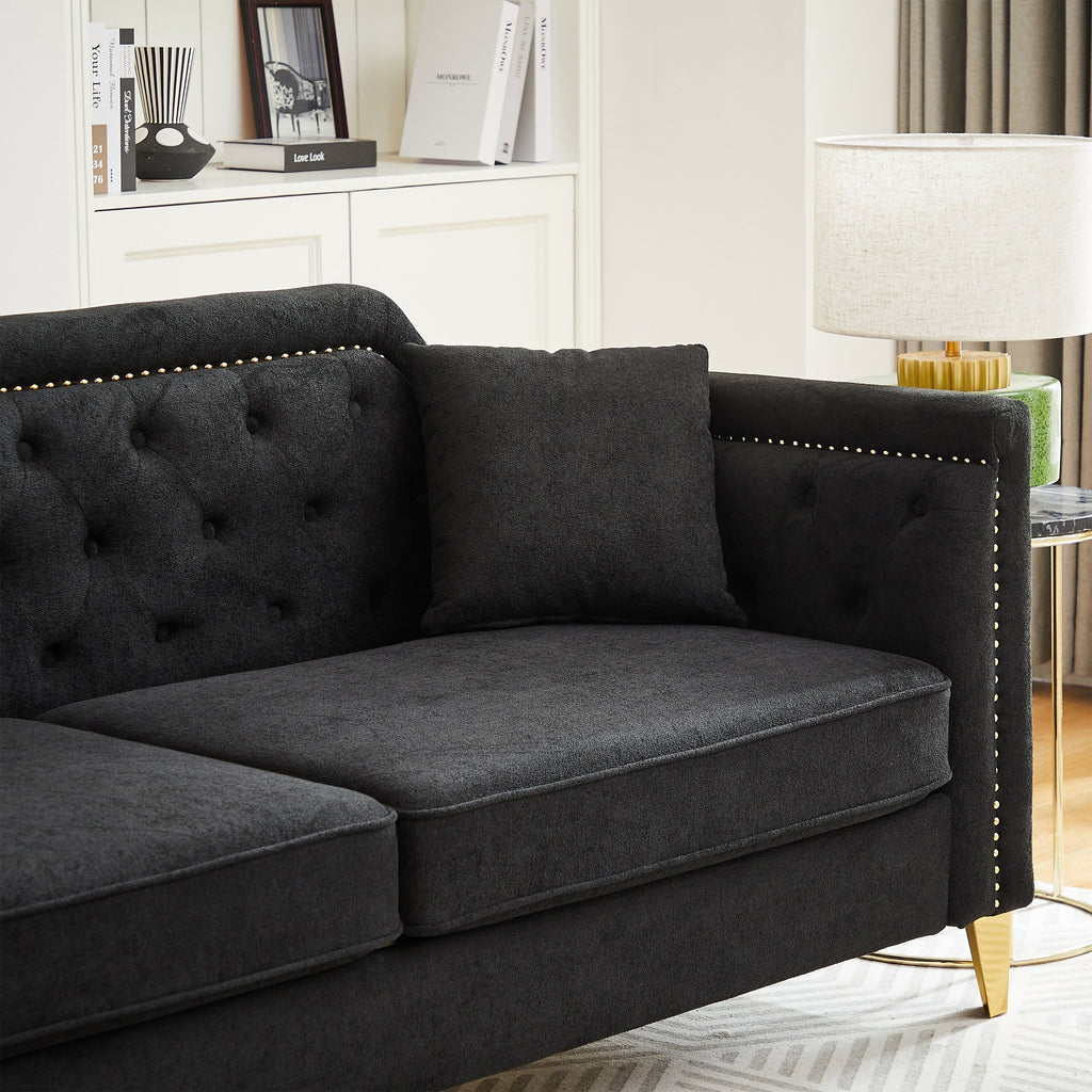 Canapé capitonné 3 places en chenille avec décoration cloutée en cuivre