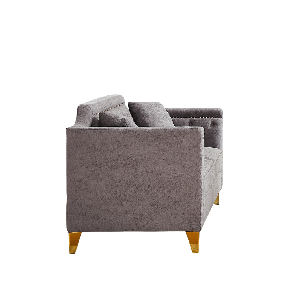 Canapé capitonné 3 places en chenille avec décoration cloutée en cuivre