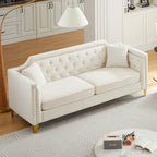 Canapé capitonné 3 places en chenille avec décoration cloutée en cuivre