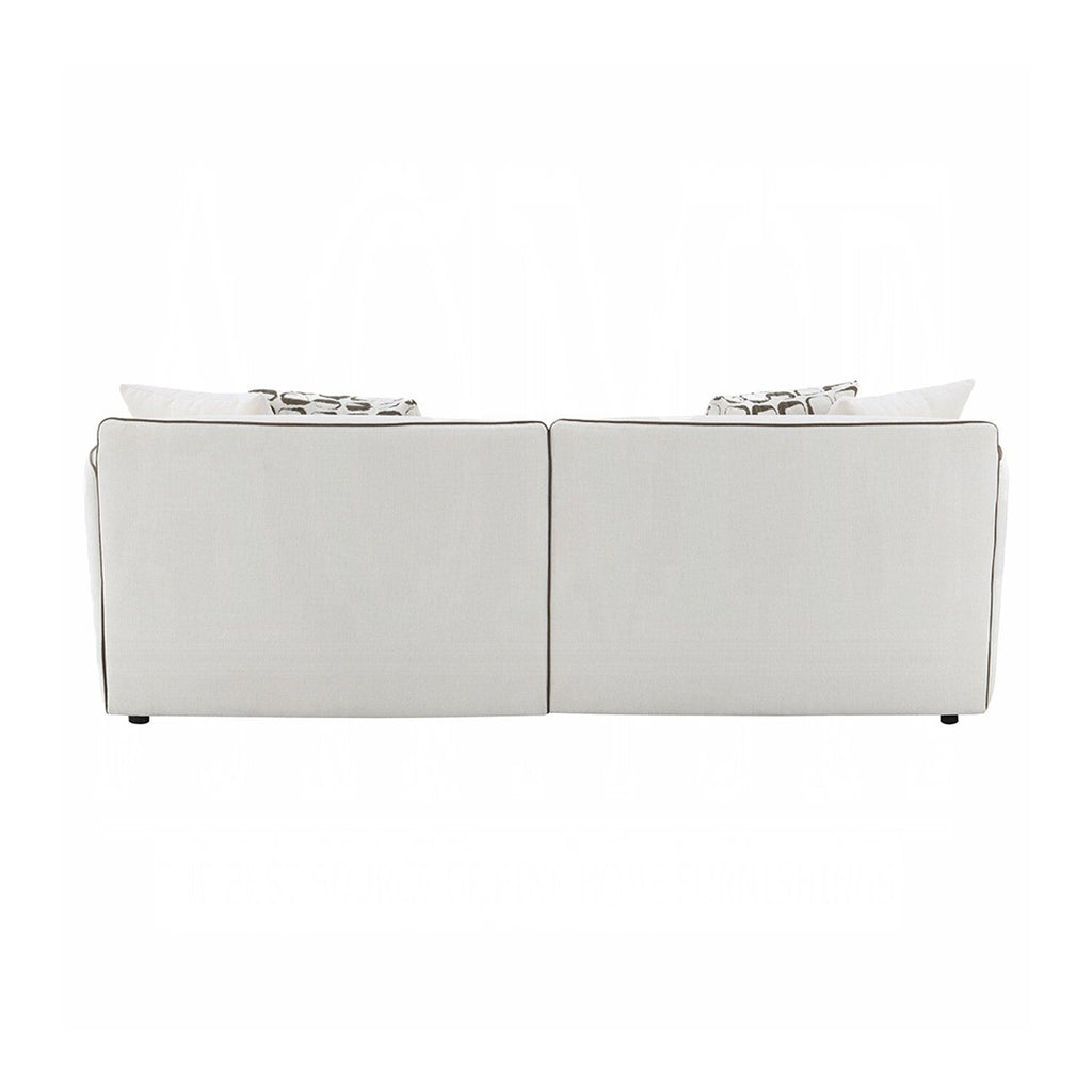 Canapé rembourré en chenille beige avec 4 coussins