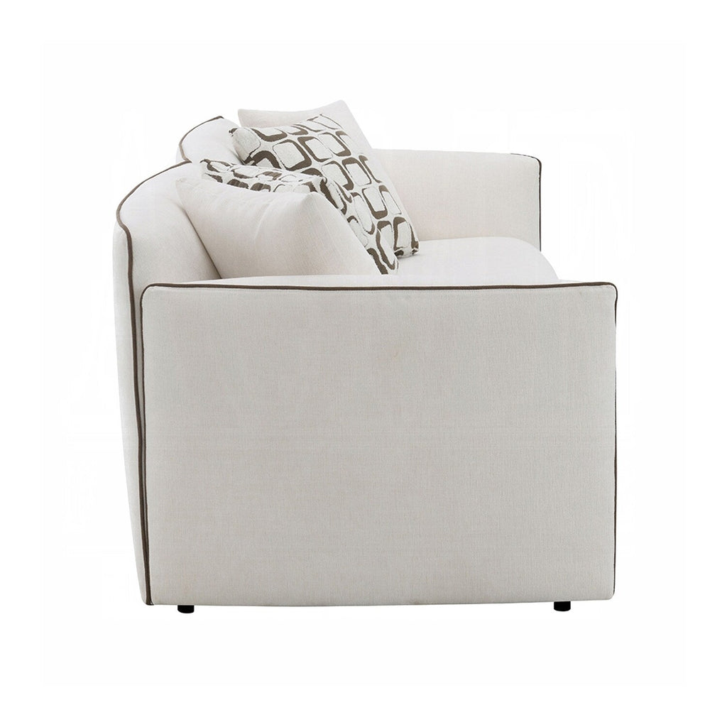 Canapé rembourré en chenille beige avec 4 coussins