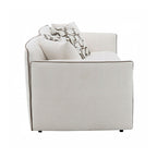 Canapé rembourré en chenille beige avec 4 coussins