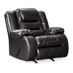 Fauteuil inclinable à bascule manuel Cherie, similicuir noir brillant moelleux