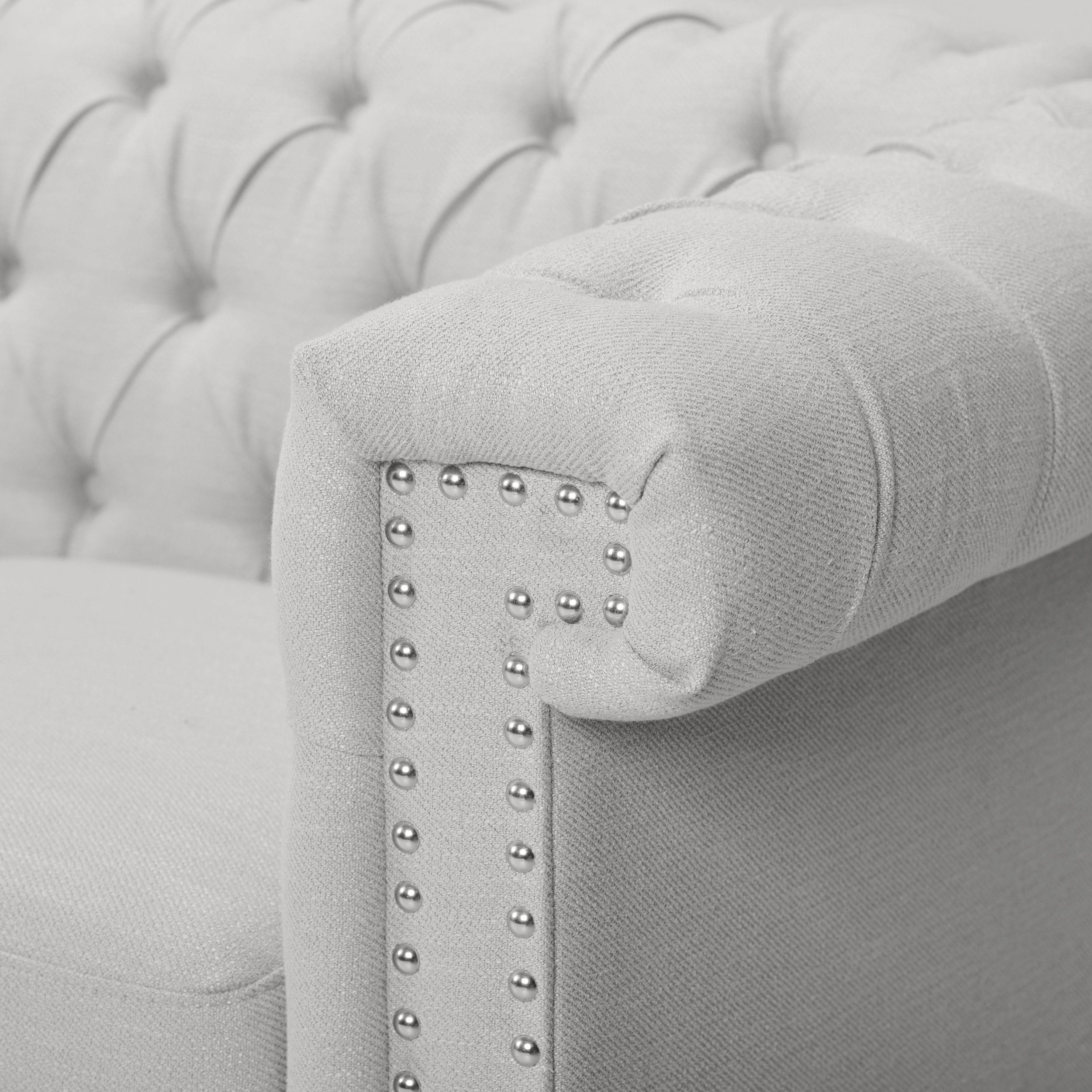 Canapé Chesterfield 3 places avec capitonnage à boutons et clous décoratifs