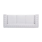 Canapé Chesterfield 3 places avec capitonnage à boutons et clous décoratifs