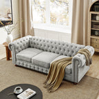 Canapé Chesterfield capitonné 3 places en PU avec accoudoirs à volutes et décoration cloutée
