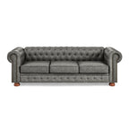 Canapé Chesterfield capitonné 3 places en PU avec accoudoirs à volutes et décoration cloutée