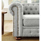 Canapé Chesterfield capitonné 3 places en PU avec accoudoirs à volutes et décoration cloutée