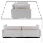 Canapé trois places classique et élégant en velours côtelé avec deux coussins décoratifs