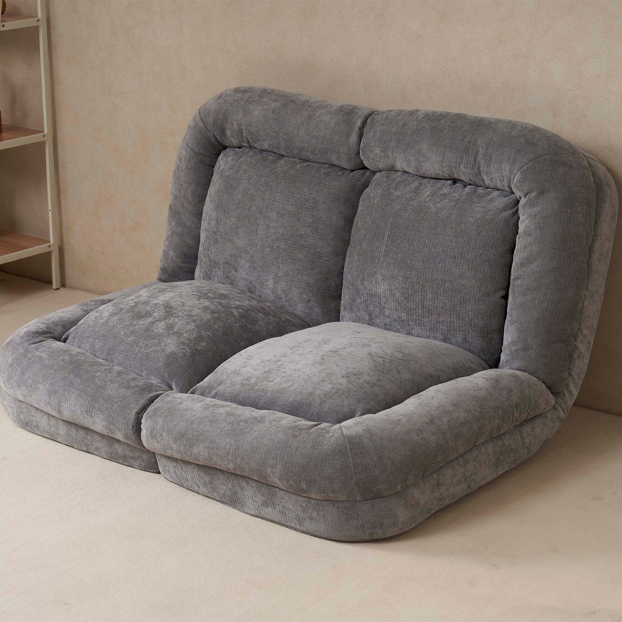 Canapé-lit double convertible avec fonction dépliante pour des options d'assise et de couchage polyvalentes