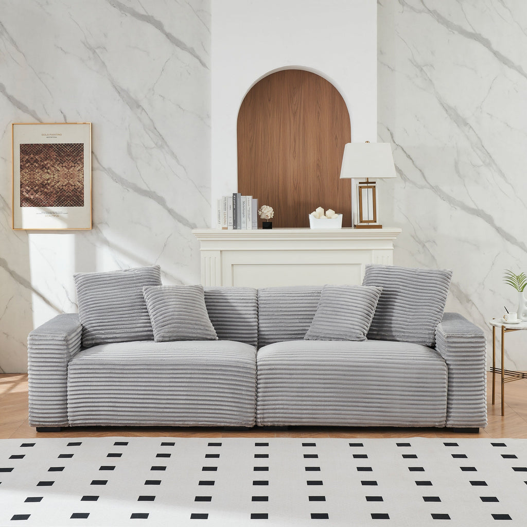 Canapé 4 places en velours côtelé avec coussins décoratifs