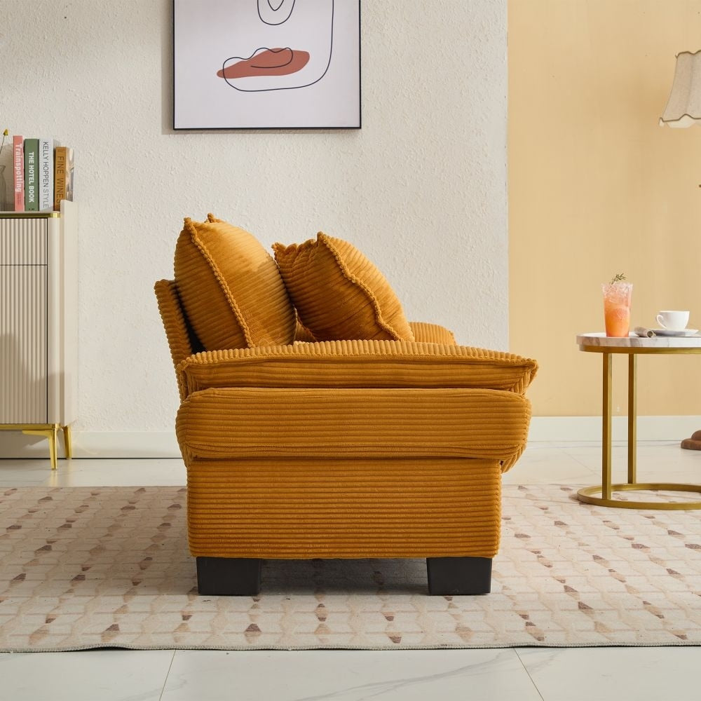 Canapé à assise profonde rembourré en velours côtelé