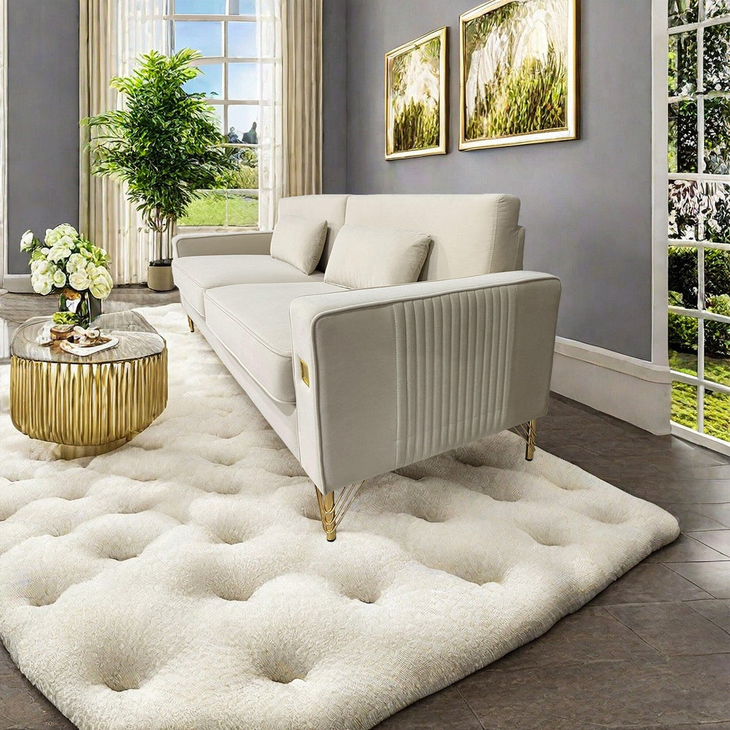 Canapé 3 places en velours blanc crème avec touches dorées