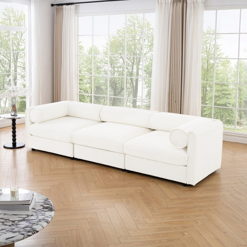 Canapé en chenille avec dossier et accoudoirs cylindriques et siège de rangement