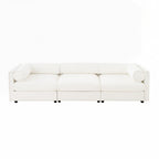 Canapé en chenille avec dossier et accoudoirs cylindriques et siège de rangement