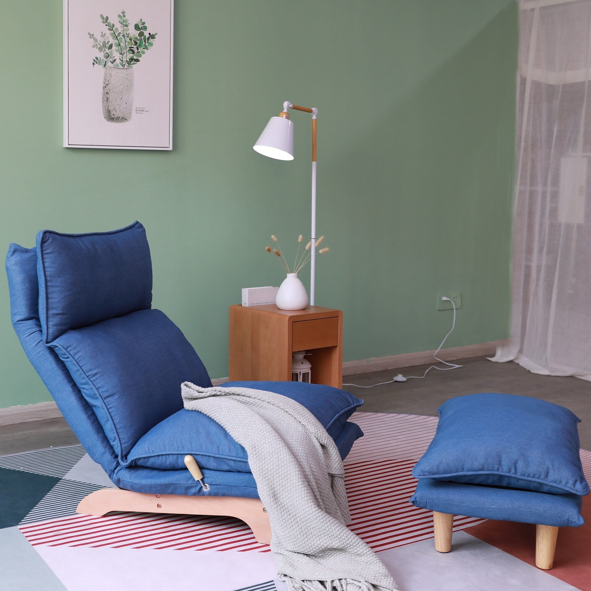 Fauteuil inclinable manuel sans accoudoirs rembourré bleu foncé avec pouf, appui-tête et dossier réglables, position à plat à 180°