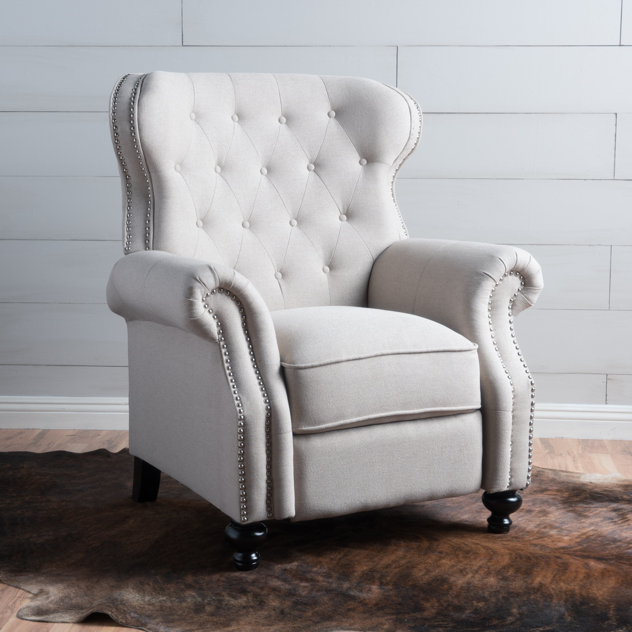 Fauteuil inclinable capitonné à point de diamant avec garniture cloutée