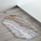 Tapis de bain moussant ovale Elle Decor à imprimé agate