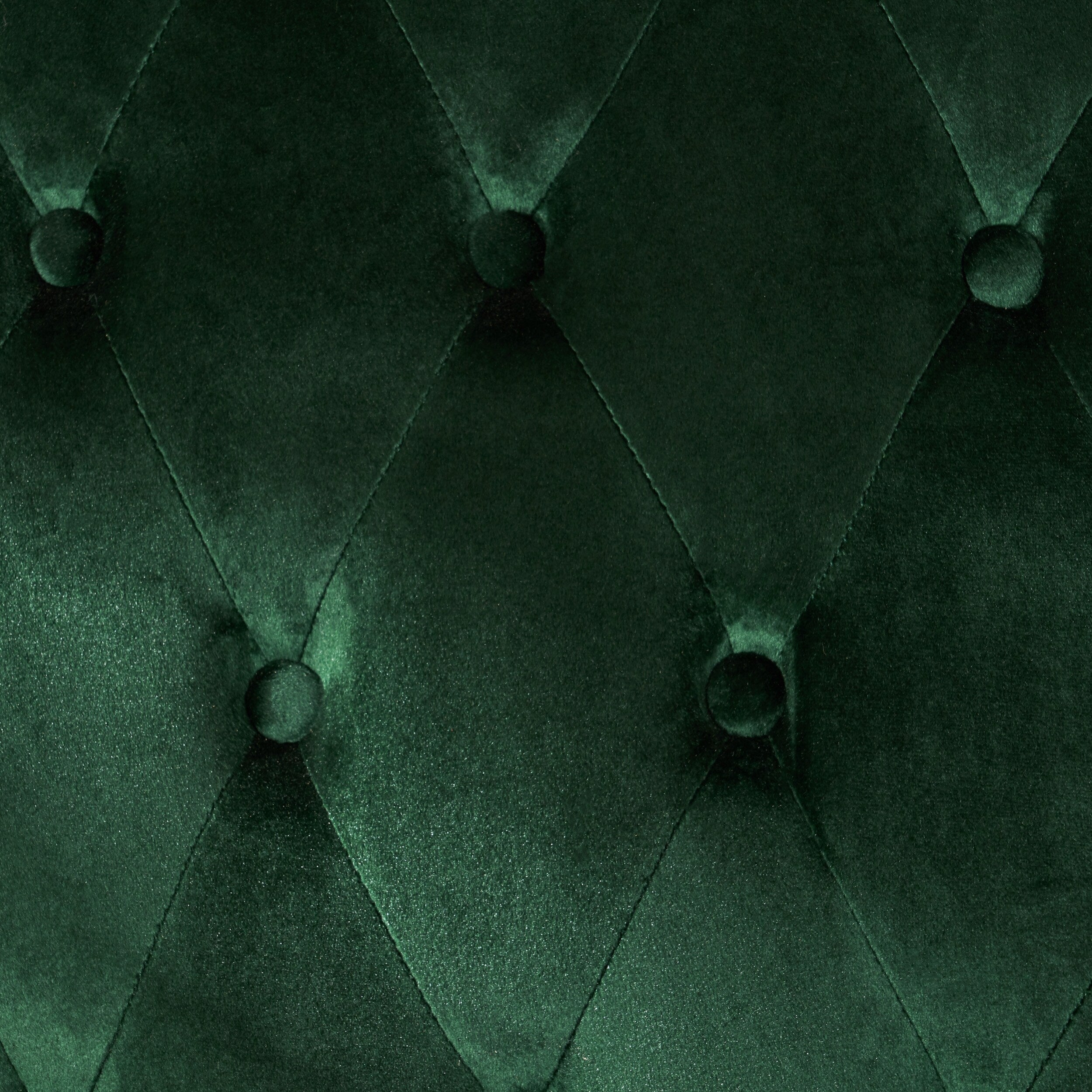 Canapé à oreilles hautes capitonné en velours émeraude